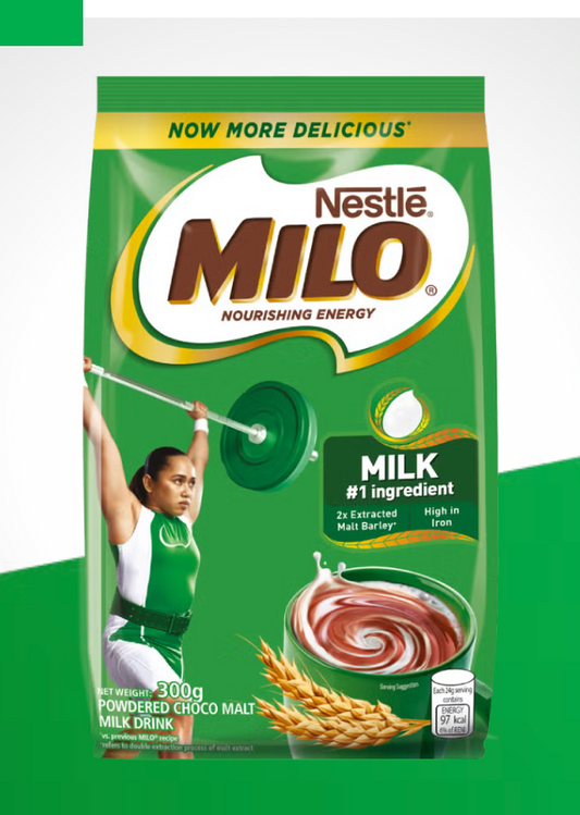 A 300g bag of Nestle Milo Powdered Choco Malt drink mix, featuring a green packaging design with the brand logo, an illustration of a woman lifting weights, and a bowl of chocolate malt drink.