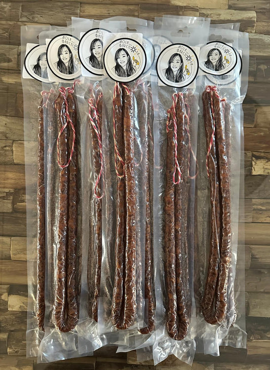 Packaged chorizito filipino sausages with brand stickers pinay sa barcelona.